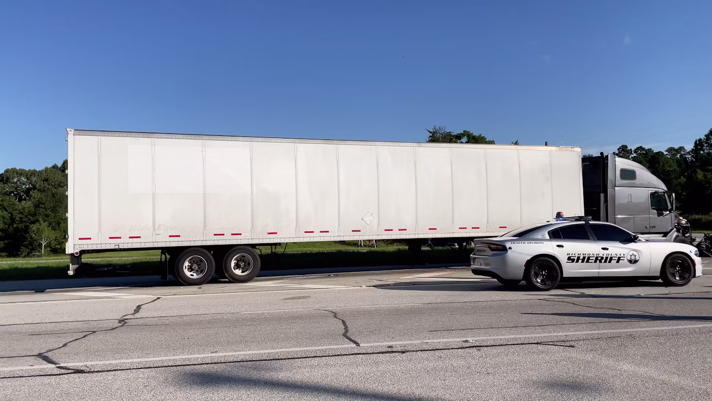 sheriff pulling over semi truck
